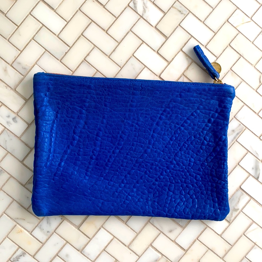 Clare v. Clutch blue with red zipper